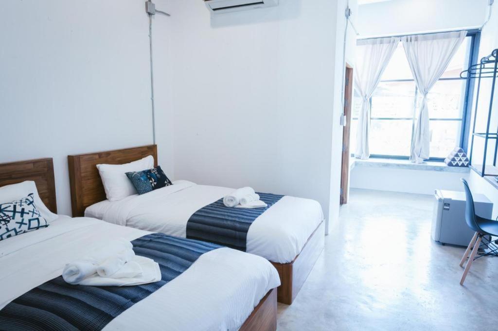 Hug Inn Phrae Extérieur photo